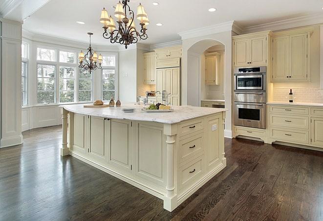 newly installed grey laminate flooring in modern kitchen in Corona CA